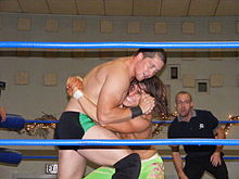 Cole (right) wrestling Kyle O'Reilly (left) in their quarter-final match at Chikara's 2010 Young Lions Cup tournament Adam Cole vs Kyle O'Reilly.jpg