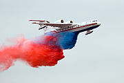 Beriev Be-200 dropping water painted into the national colors at the 2009 MAKS Airshow