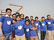people standing in a group wearing Wikipedia shirts