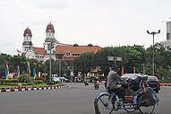Photograph of Lawang Sewu, taken from across the nearby roundabout.