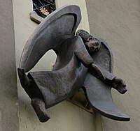 Angel of Peace, bronze, 2008. St. Teresa's Carmelite Church, Dublin. Many of Stuart's later works combine imagery of dolmens and praying hands.[30][31]