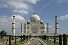 The Taj Mahal at Agra, Uttar Pradesh, India, is the most famous example of Mughal Architecture and one of India's most recognisable landmarks in general Taj Mahal, Agra, India.jpg