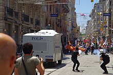 TOMA vehicles with water cannons were widely used by police. Tear Gas used on Istiklal Caddesi near Taksim Square - Gezi Park, Istanbul - Flickr - Alan Hilditch.jpg