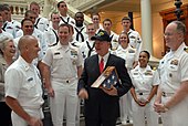 Perdue with U.S. Navy sailors in October 2010 US Navy 101013-N-6736S-066 Georgia Gov. Sonny Perdue, center, is presented a command ball cap by Master Chief Richard Rose.jpg