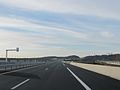 L'A432 longeant la LGV Rhône-Alpes et le viaduc de La Côtière en arrière-plan.