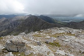 View from south ridge of Benbaun to Bencollaghduff, with ridge to Bencorr and Derryclare behind