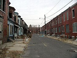 In many countries, the lowest stratum of the working class, the underclass, often lives in urban areas with low-quality civil services Camden NJ poverty.jpg