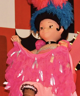 Can-can dancer doll, an audio-animatronic doll, represent France in the 1964 Disney boat ride It's a Small World. CanCanDollsIASW.png