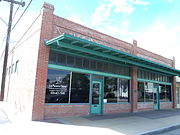 The Pioneer Market was built in 1922 and is located at 119 N. Florence St. It was listed in the National Register of Historic Places in 1985, reference #85000919.