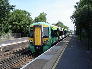 Hassocks Station - train arriving from London - geograph.org.uk - 1169890.jpg