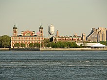 View from the southeast; the baggage and dormitory (right) is east of the main building (left) New York City Ellis Island 04.jpg