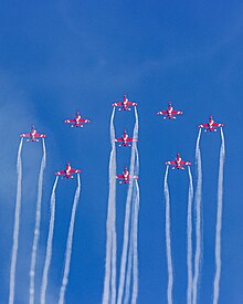 9 BAE Hawk Mk.132 of the Suryakiran Aerobatic Team in the diamond formation. SKAT123.jpg