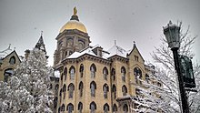 The Main Building at the University of Notre Dame, a prominent Catholic university in the United States Winter Dome.jpg