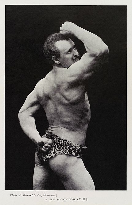 Eugen Sandow, posing in very little clothing. Though this is somewhat well-dressed for him...