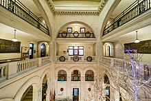 Interior atrium decorated for the December holidays. Albany City Hall interior atruim.jpg