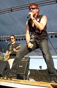 FireHouse, 2008. Vocalist and songwriter CJ Snare with guitarist and songwriter Bill Leverty CJ Snare of FireHouse (2008).jpg