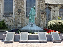 Photographie en couleur représentant le monument aux morts d'Escaudain.
