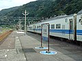 駅に停車中の419系電車（JR西日本時代）