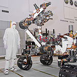 The turret at the end of the robotic arm holds five devices. Msl-arm.jpg