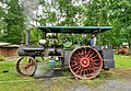 Person operating a Case steam tractor in Bangor PA