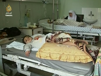 Palestinian girl hospitalized during the Gaza War Samar - Day 18.PNG