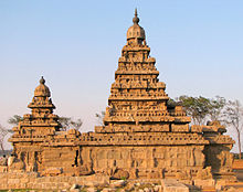 The rock-cut Shore Temple of the temples in Mahabalipuram, Tamil Nadu, 700-728 showing the typical dravida form of tower. Shore Temple 01.jpg