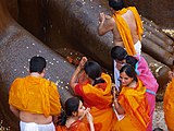 K13. A Jain family praying at Shravanabelagola, Karnataka.