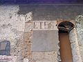Ancienne inscription « ETES » de « SALLE DES FETES », sur la façade Sud de l'église.