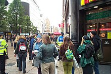 An anti-McDonald's leafleting campaign in front of the McDonald's restaurant in Leicester Square, London, during the European Social Forum season, 16 October 2004 Anti-McDonalds protest Leicester Square London 20041016.jpg