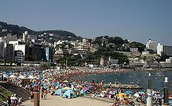 Beach in Atami City with sea bathers