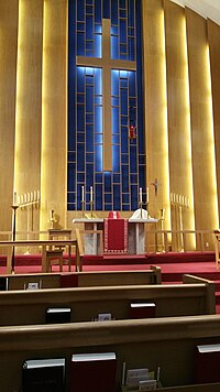 The chancel of a Lutheran church decorated with red paraments, the liturgical colour of the last week of Lent, Holy Week, in the Lutheran and Anglican Churches Chancel on Maundy Thursday.jpg