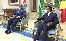 President Felix Tshisekedi with the president of neighbouring Republic of the Congo Denis Sassou Nguesso in 2020; both wear face masks due to the ongoing COVID-19 pandemic. Felix Tshisekedi & Denis Sassou-Nguesso.jpg