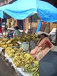 Fruit vendor at Mapusa market, Goa, India