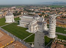 The Piazza dei Miracoli, with Pisa Cathedral, the Pisa Baptistery, and the Leaning Tower of Pisa, in Pisan Romanesque style Italy - Pisa - Leaning Tower of Pisa.jpg