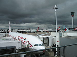 Planes parked at London Heathrow Airport.