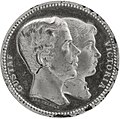 V. Gusztáv svéd királyt és Viktória svéd királynét ábrázoló érme