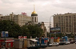 Modern Moscow; the Sanyo sign overlooks the statue of Lenin, barely visible above the billboard