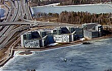 The former Nokia House, Nokia's head office until April 2014. The building is located by the Gulf of Finland in Keilaniemi, Espoo, and was constructed between 1995 and 1997. It was the workplace of more than 1,000 Nokia employees Nokian paakonttori Keilaniemessa.jpg