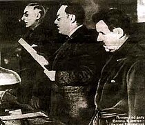 Prosecutor General Andrey Vyshinsky (centre) reading the 1937 indictment against Karl Radek during the 2nd Moscow trial Radek's action.jpg