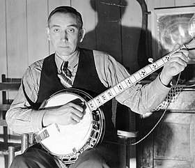 Wade Ward in 1937 holding a 5-string banjo