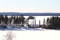 Oljeön is in the foreground. The picture is taken from Ängelsberg.