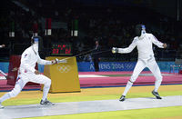 Russian Ivan Tourchine and American Weston Kelsey fence in the second round of the Men's Individual Épée event in the 2004 Summer Olympics at the Helliniko Fencing Hall on August 17, 2004.