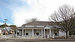 Victorian corner house with splayed corner, veranda, loft-windows and louvred woodwork. These properties form an integral part of the historical and architectural nucleus of Paarl. The houses on these erven, the majority of which date from the nineteenth century are representative of the Cape Dutch, Georgian. Victorian and Edwardian styles o