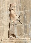 Artaxerxes III on his tomb relief.jpg
