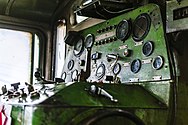 Green control panel, with many gauges