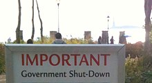 A government shutdown notice posted on October 1, 2013, with the Statue of Liberty in the far background Important government shutdown notice for the Stature of Liberty.jpg
