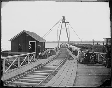 The Long Bridge crossing the Potomac looking toward Alexandria, VA with General Daniel McCallum (with the beard)