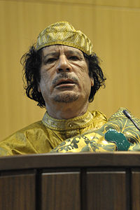 http://upload.wikimedia.org/wikipedia/commons/thumb/6/6c/Muammar_al-Gaddafi%2C_12th_AU_Summit%2C_090202-N-0506A-534_cropped.jpg/200px-Muammar_al-Gaddafi%2C_12th_AU_Summit%2C_090202-N-0506A-534_cropped.jpg