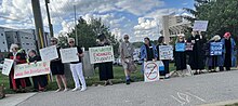 Pro-Palestinian protestors on a sidewalk in Bloomington, Indiana, on the Indiana University campus on May 4, 2024.