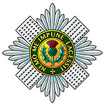 Regimental badge of the Scots Guards. Scots Guards Badge.jpg